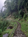 Rocky path on a mountain cliff during a drizzle Royalty Free Stock Photo