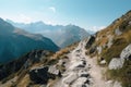 rocky path winding up the side of majestic mountain range, with view of distant peaks