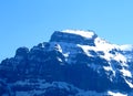 Rocky peak VrenelisgÃÂ¤rtli GlÃÂ¤rnisch or Vrenelisgaertli Glaernisc in Glarus Alps mountain range, over the KlÃÂ¶ntalersee lake Royalty Free Stock Photo