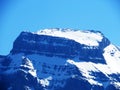 Rocky peak VrenelisgÃÂ¤rtli GlÃÂ¤rnisch or Vrenelisgaertli Glaernisc in Glarus Alps mountain range, over the KlÃÂ¶ntalersee lake Royalty Free Stock Photo