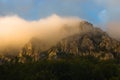 Rocky peaks at foggy sunrise, trekking path at Suva Planina mountain Royalty Free Stock Photo