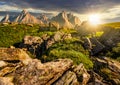 Rocky peaks and rocks on hillside in Tatras at sunset Royalty Free Stock Photo