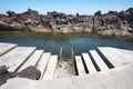 Rocky pool beach with stairs in Biscoitos. Terceira island. Azor