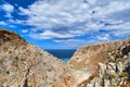 Rocky red cliffs, blue sea, clear blue sky and beautiful sky. Stefanou beach, Seitan Limania, Akrotiri peninsula, Chania