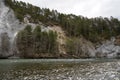 Rocky river bank of Anterior Rhine in Ruinaulta ravine or gorge in Switzerland.