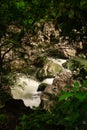 Rocky river banks with white water rapids Royalty Free Stock Photo