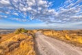 Rocky Road through hilly Mediterranean landscape on the island of Cyprus Royalty Free Stock Photo