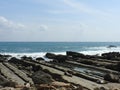 The rocky road leading to the sea, the former way blue sea and sky