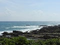 The rocky road leading to the sea, the former way blue sea and sky.