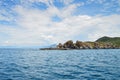 Rocky rock ridge in the South China Sea, the coastline of the island of Hong-Mun Royalty Free Stock Photo