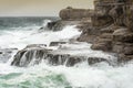 Rocky and rough coast waves breaking