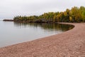 Rocky, rugged shoreline of Lake Superior near Grand Marais, Minnesota, during autumn fall season Royalty Free Stock Photo
