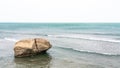 Rocky sea beach with boulder