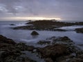 Rocky sea beach at dusk Royalty Free Stock Photo