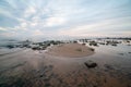 Rocky sea beach with wide angle perspective Royalty Free Stock Photo