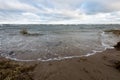 Rocky sea beach with wide angle perspective Royalty Free Stock Photo