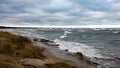 Rocky sea beach with wide angle perspective Royalty Free Stock Photo