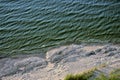 Rocky sea shore illuminated by the sun