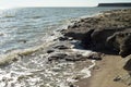 Rocky sea shore illuminated by the sun