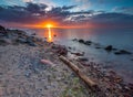 Rocky sea shore at sunrise. Beautiful seascape Royalty Free Stock Photo