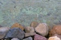 Rocky seashore with blue water. Colorful Red Sea