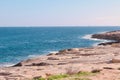 Rocky seashore line with no people in Marsaskala, Malta. Mediterranean sea