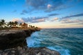 Rocky seashore at sunset. Malikon in Santo Domingo. Caribbean travel destination