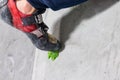 Rocky shoe on a tiny, scanty snare stands with the tip of the sock in close-up on the climbing wall in the room Royalty Free Stock Photo