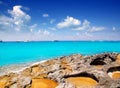 Rocky shore of formentera turquoise sea Royalty Free Stock Photo