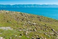 The rocky shore of Lake Sevan, a natural landmark of Armenia Royalty Free Stock Photo