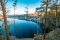 Rocky shore of a mountain lake on a misty morning Royalty Free Stock Photo