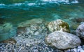Rocky shore of a mountain river with clear water Royalty Free Stock Photo