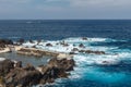 Rocky shore and natural pool. Royalty Free Stock Photo