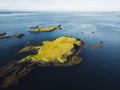 Rocky shore off of the Stykkisholmur, with a lot of little islands in the sea