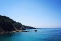 Rocky shore. Southern coast of Turkey. Calm blue sea and clear sky. Royalty Free Stock Photo