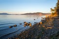 Rocky shore of Swift`s Bay on Lopez Island, Washington, USA Royalty Free Stock Photo