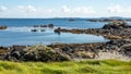 Rocky shoreline at Inishbofin or White Cow Island with the horizon over the Atlantic Ocean