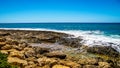 The rocky shoreline of the west coast of the island of Oahu at the resort area of Ko Olina Royalty Free Stock Photo