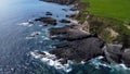 Rocky shores along the route of the Wild Atlantic Way, top view. Seascape of the southern coast of Ireland. Beautiful rocky slopes Royalty Free Stock Photo