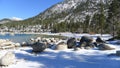 Huge Boulders on the snowy beach of Lake Tahoe Royalty Free Stock Photo