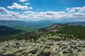 The rocky slope and mountain valleys on a cloudy day