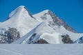 Lyskamm traverse knife edge snow ridge glacier walk and climb in the Alps Royalty Free Stock Photo