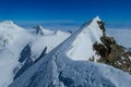 Alps traverse knife edge snow ridge glacier walk and climb Royalty Free Stock Photo