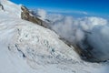 Lyskamm traverse knife edge snow ridge glacier walk and climb in the Alps Royalty Free Stock Photo