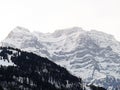 Rocky snowy alpine peaks VrenelisgÃÂ¤rtli Vrenelisgaertli or Vrenelisgartli and Ruchen during winter in the GlÃÂ¤rnisch Glaernisch Royalty Free Stock Photo