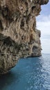 Rocky steep coast of the blue Mediterranean sea