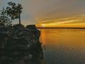 Rocky sunset overlooking the lake Royalty Free Stock Photo
