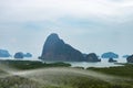 Rocky tropical landscape and mist