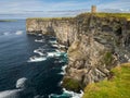 Rocky vertical cliff at Marwick Head RSPB reserve, Mainland, Orkney, Scotland Royalty Free Stock Photo