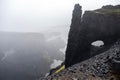 Rocky volcanic hills on a cloudy day while hiking Iceland. Royalty Free Stock Photo